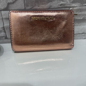 Michael Kors Medium Bifold Zip Coin Wallet 
Primrose Pink Metallic